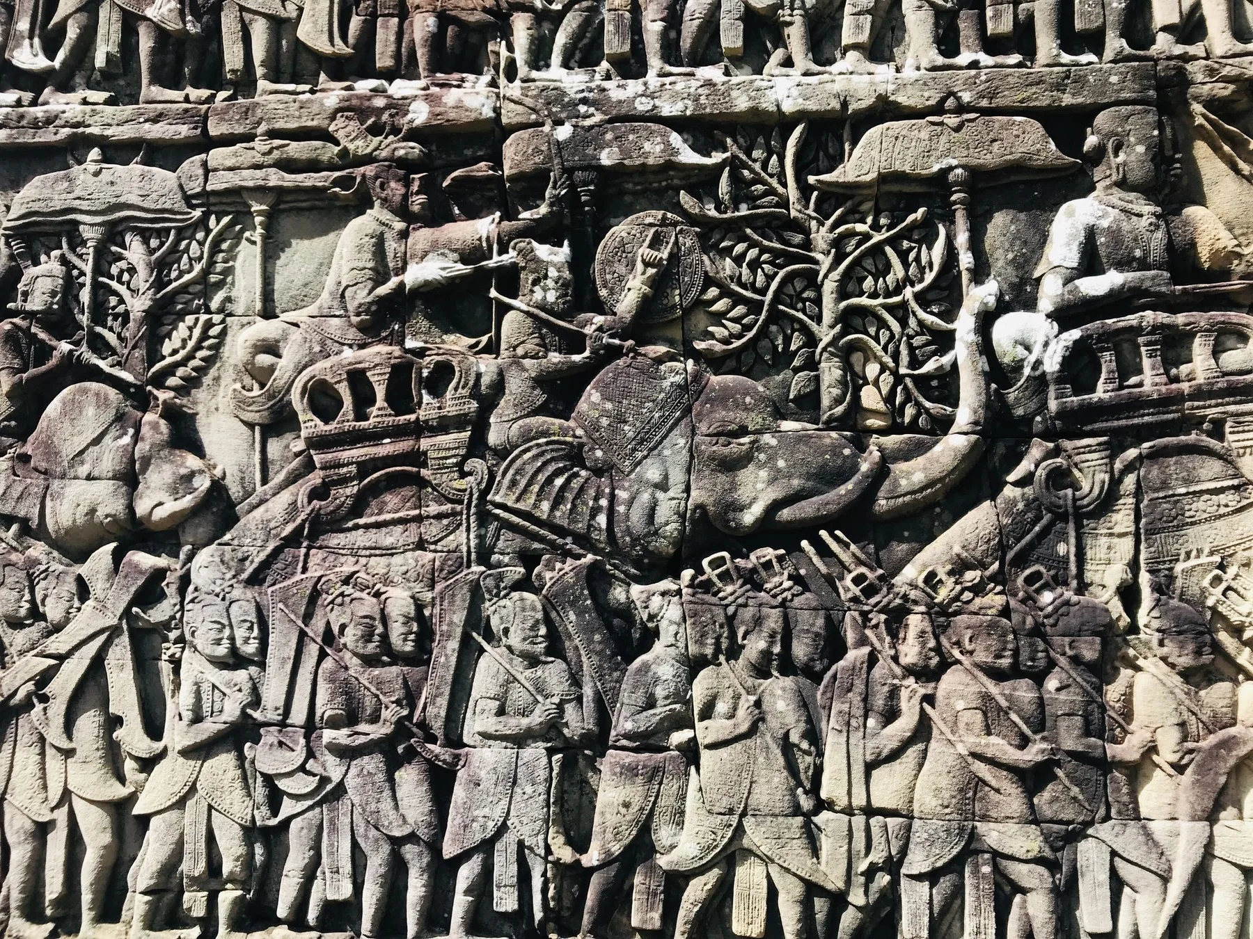Close detail of historic Khmer stone carvings in Siem Reap